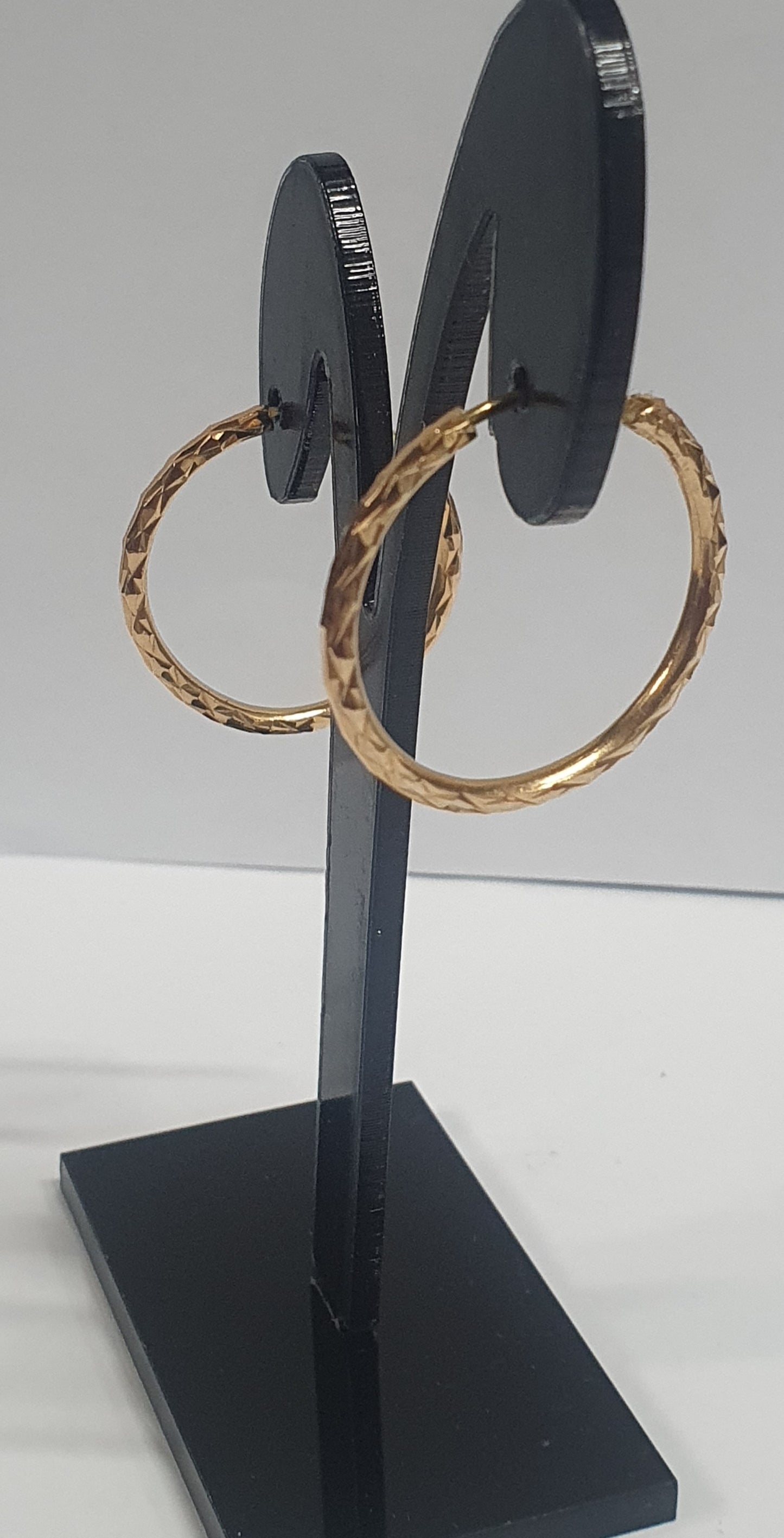 18 carat hoop earring