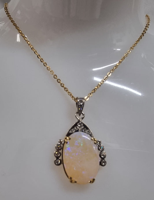 solitaire  opal and diamond pendant 18ct two tone gold