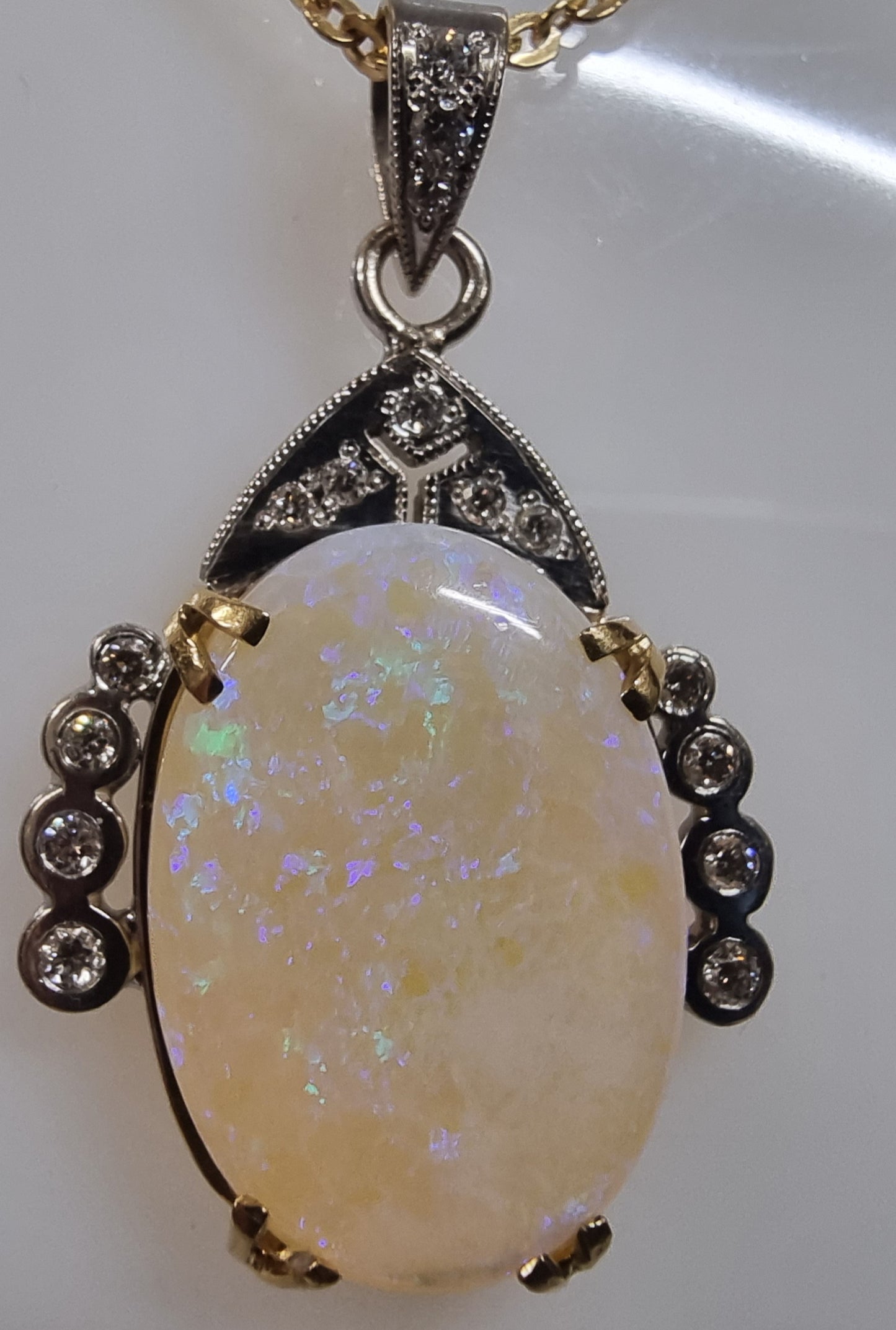 solitaire  opal and diamond pendant 18ct two tone gold