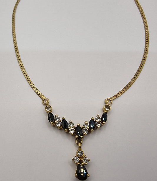 Lovely 14k yellow gold necklace,dark sapphire and crystal stone