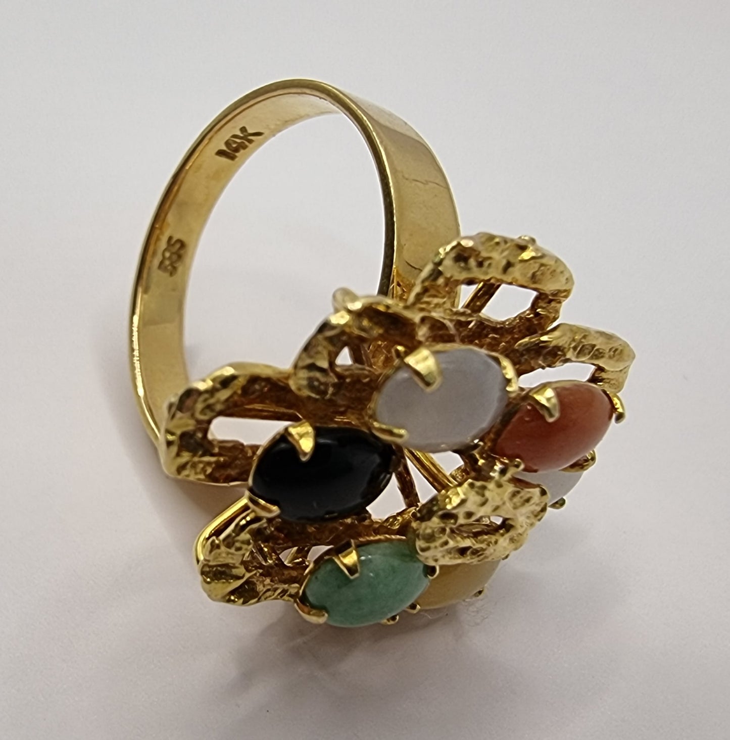 This stylish ring is made of 14ct yellow gold contains 6 multi coloured jade stone